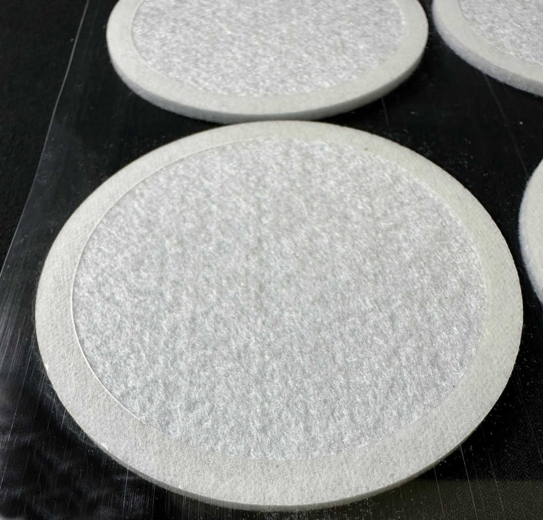 Monotub Adhesive Filter Disks close up