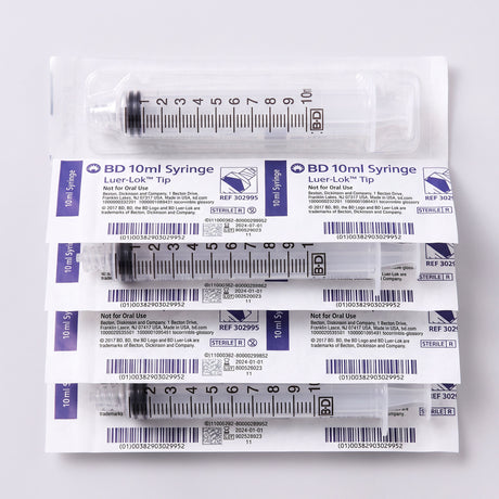 5 10cc luer lock syringes on white background