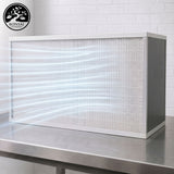 4'x2' White air filter on a metal surface with a white brick wall background