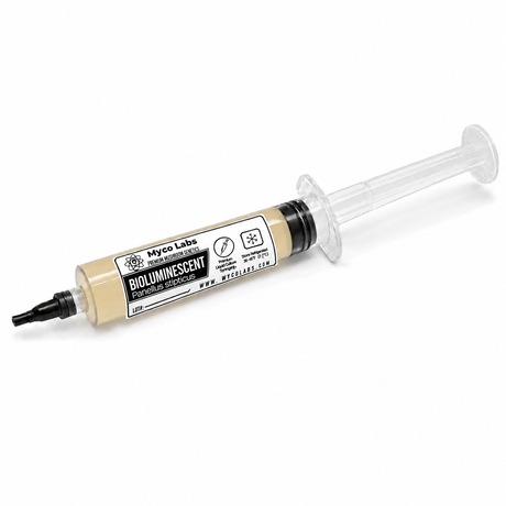 A syringe-style container of Myco Labs Bioluminescent Biofuel Injector, showing the beige gel inside a clear syringe with a black nozzle, on a white background.