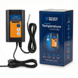 Digital temperature controller with cable next to its packaging on a white background