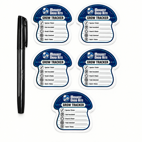 Five grow tracker stickers in different sizes displayed on a white background next to a black pen. The stickers feature a blue and white design with fields for species/strain, date inoculated, break & shake, fully collected, and batch/notes.