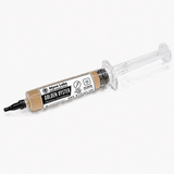 A syringe-style container of Myco Labs Golden Oyster Phosphorus Fungus Grower, filled with a beige-brown powder, shown on a light gray background.
