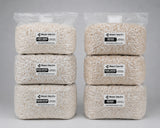 6 bags of colonized grain spawn stacked